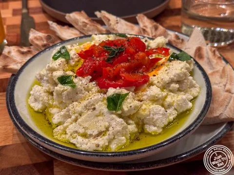 Jane Doe signature dishes Ricotta GnudiPork ChopSeasonal Crudo